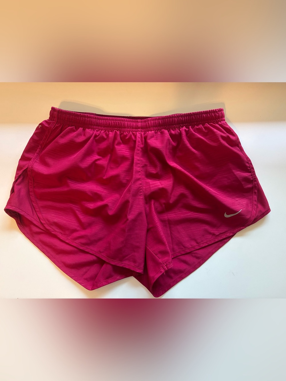 Nike Women’s Athletic Split-Hem Shorts in Fuchsia Pink